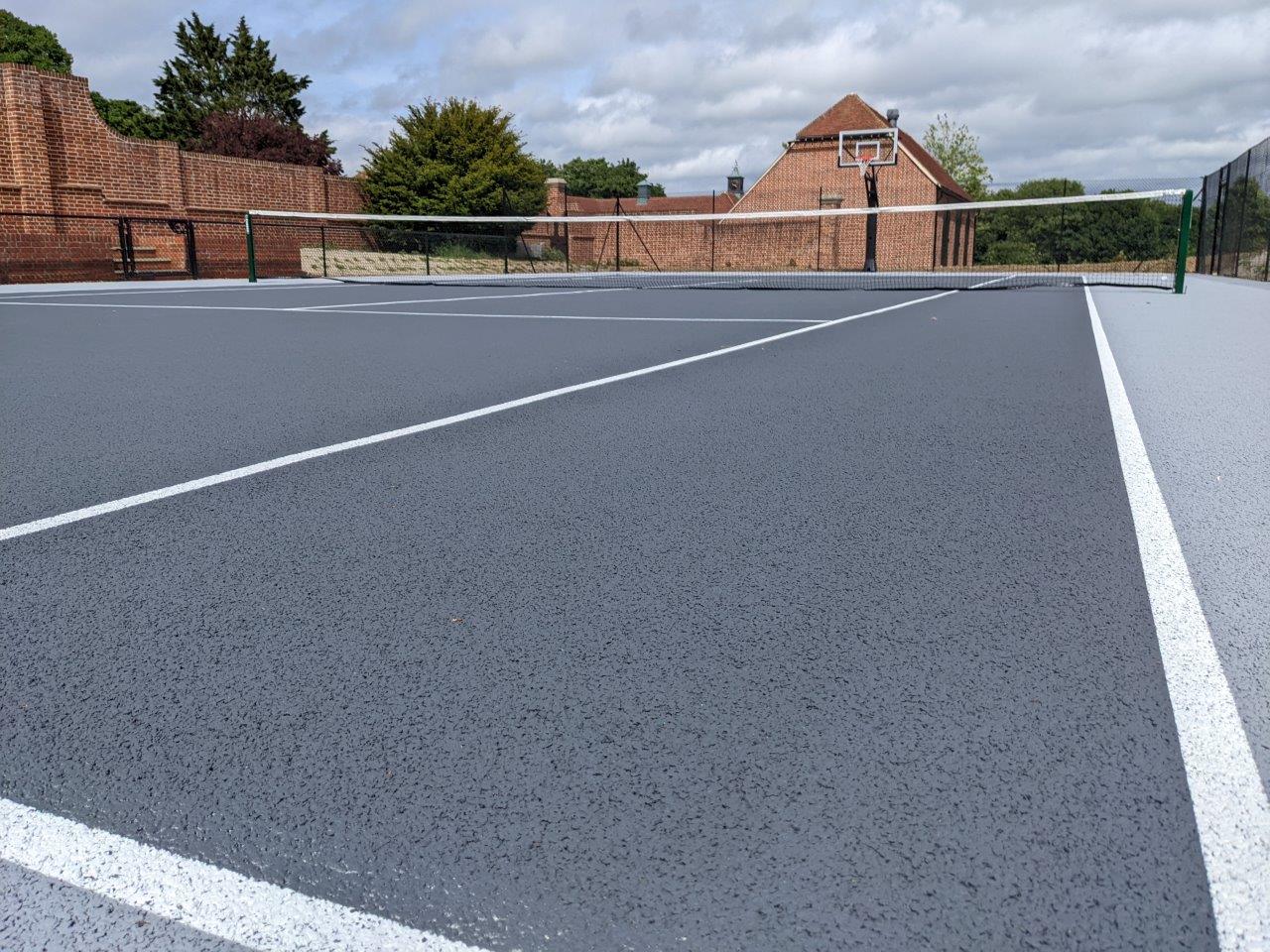 Colour-coated tennis court